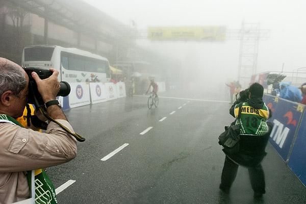 Photographers had little time to focus on the riders as they appeared from deep within the road up Genting Highlands.