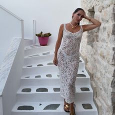 Anna LaPlaca wearing a lace Rumoured dress on vacation
