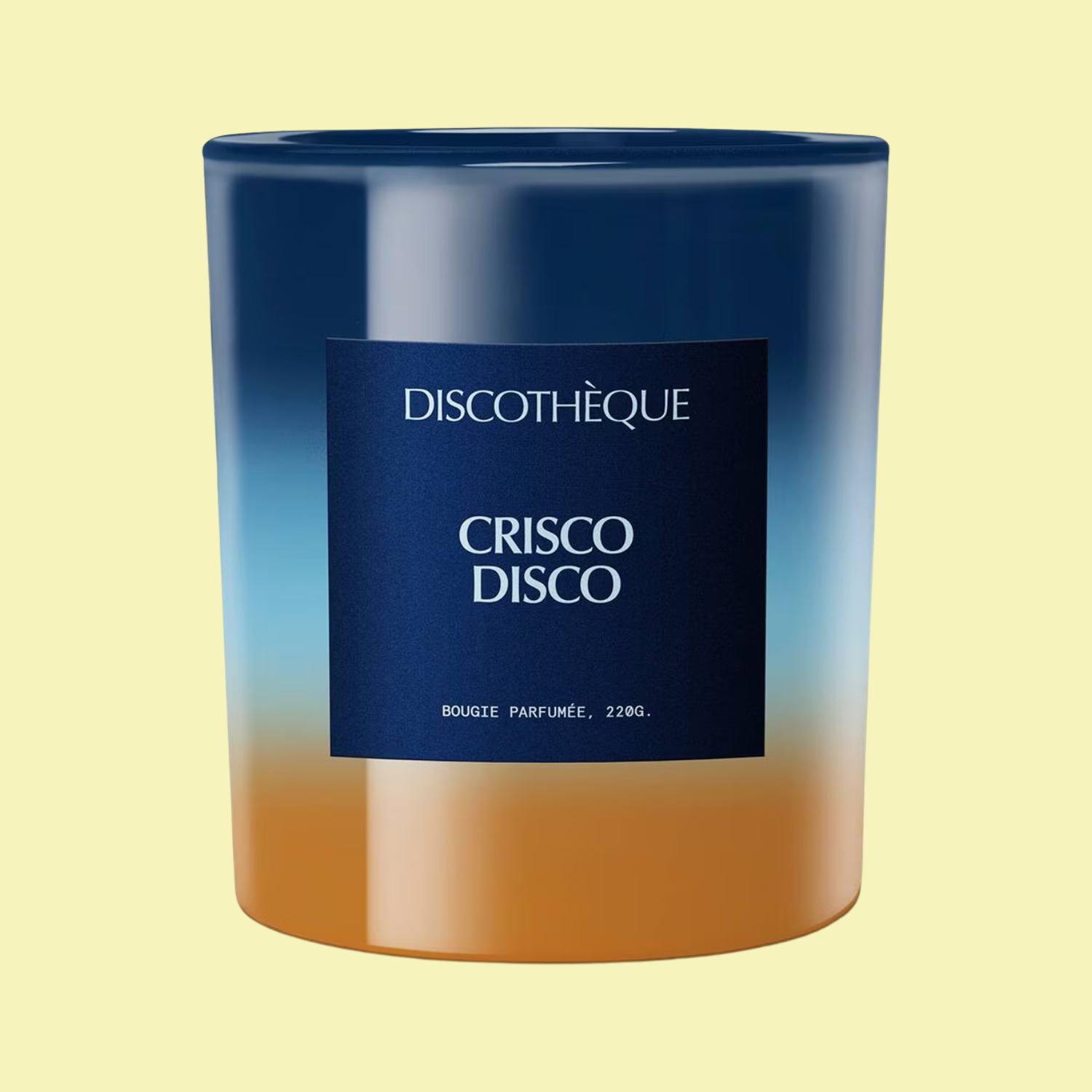 A blue and yellow candle