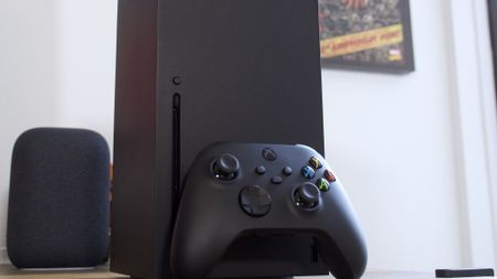 Xbox Series X console with controller on desk