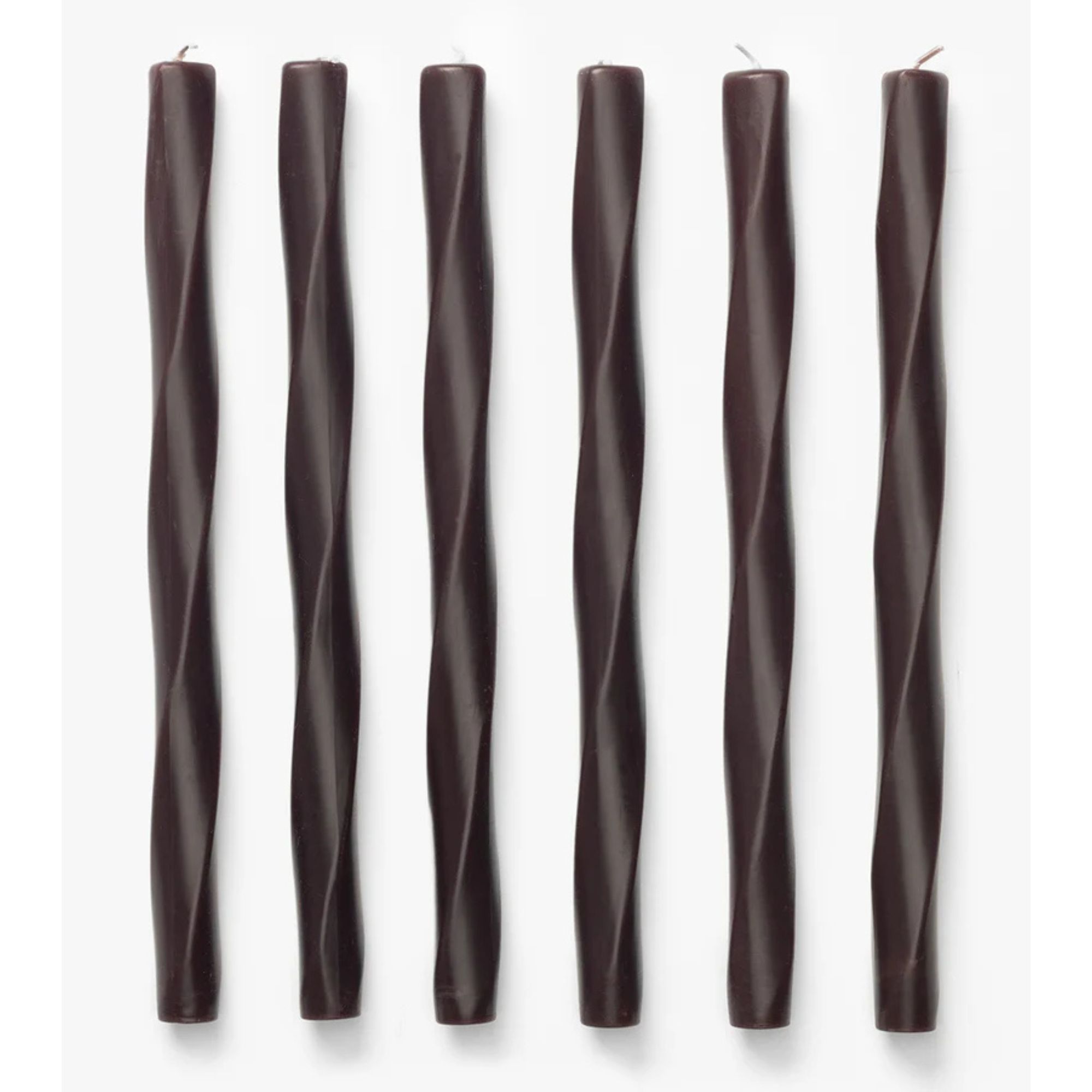 Dark brown taper candles