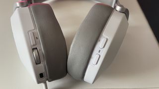 Corsair HS65 Wireless headset close up to show connection options and onboard controls