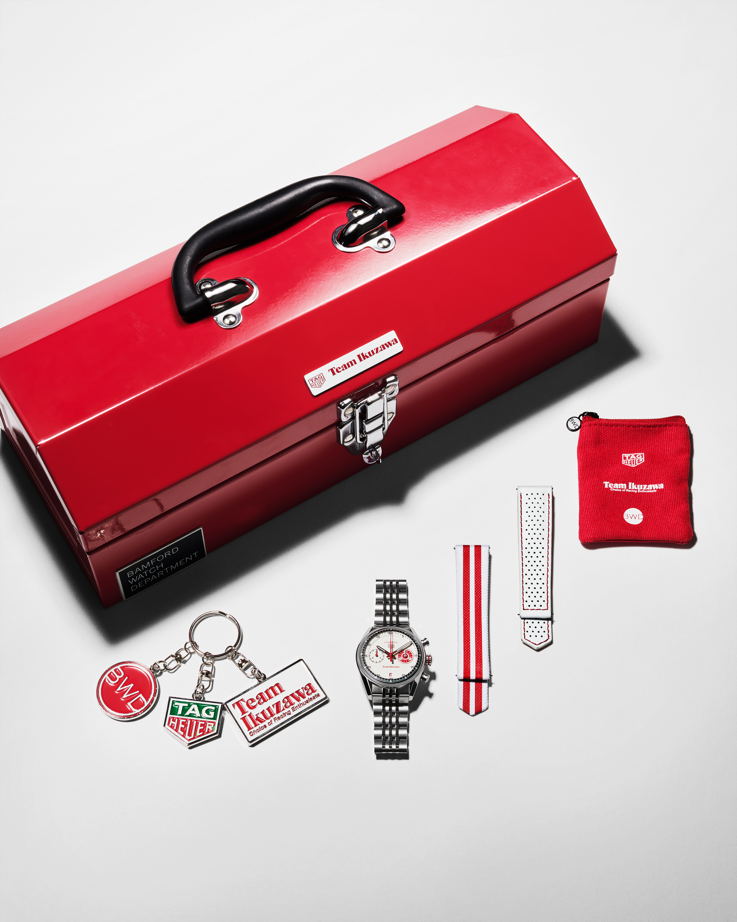 white tag heuer watc with red details