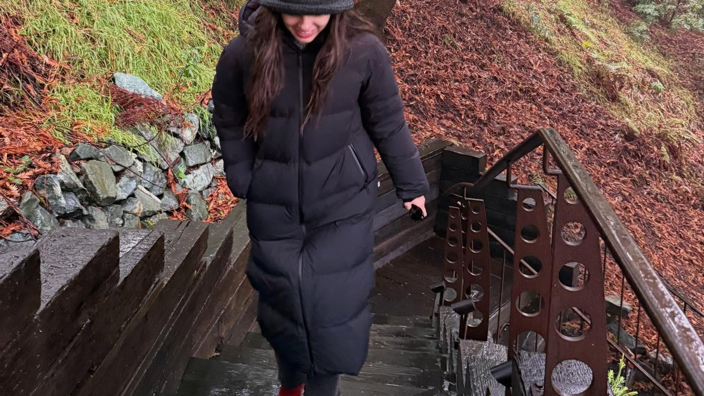 Olivia Rodrigo wearing a bucket hat and Aritzia puffer