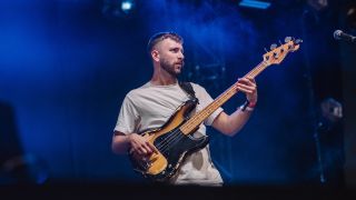 Dave Edwards onstage with August Charles