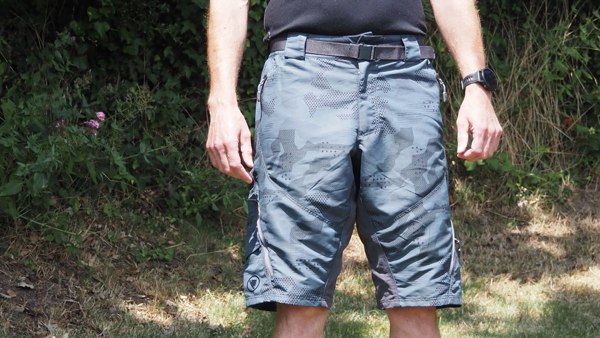 A man wearing MTB shorts