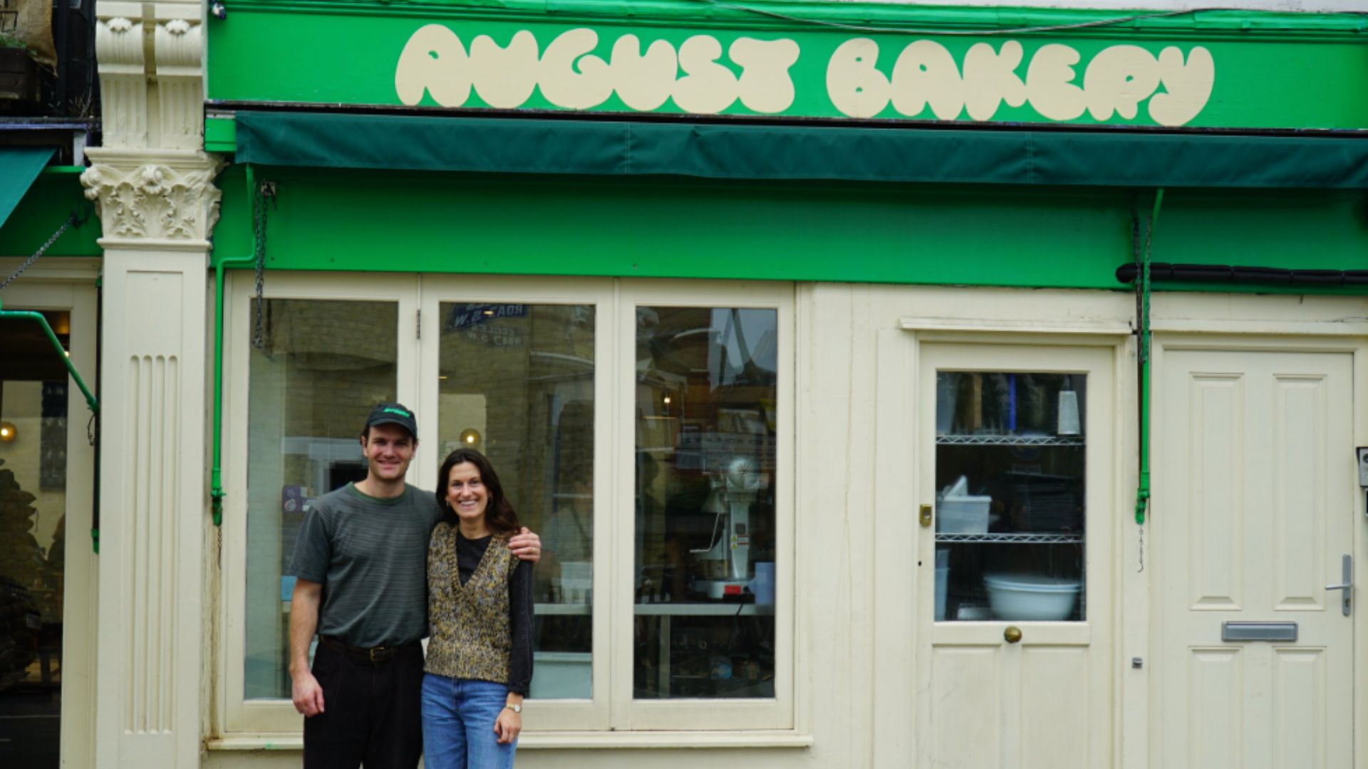 an image of husband and wife duo behind the august bakery standing outside their Battersea bakery