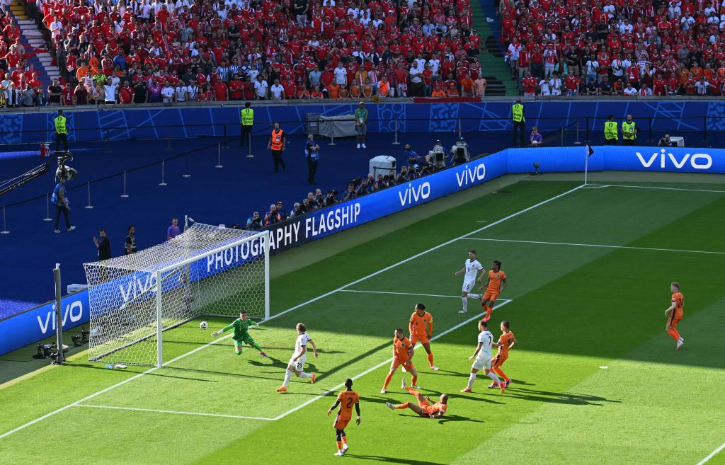 Donyell Malen of the Netherlands scores an own goal, Austria&#039;s first goal during the UEFA EURO 2024 group stage match between Netherlands and Austria at Olympiastadion on June 25, 2024 in Berlin, Germany. (Photo by Dan Mullan/Getty Images)