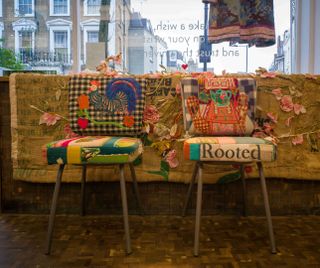 two chairs with colourful textile upholstery