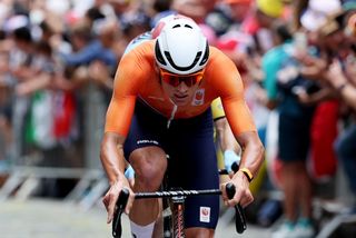 PARIS, FRANCE - AUGUST 03: Mathieu Van Der Poel of Team Netherlands attacks in the chase group during the Men&#039;s Road Race on day eight of the Olympic Games Paris 2024 at trocadero on August 03, 2024 in Paris, France. (Photo by Tim de Waele/Getty Images)