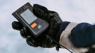 Mammut Barryvox S avalanche beacon in person's hand