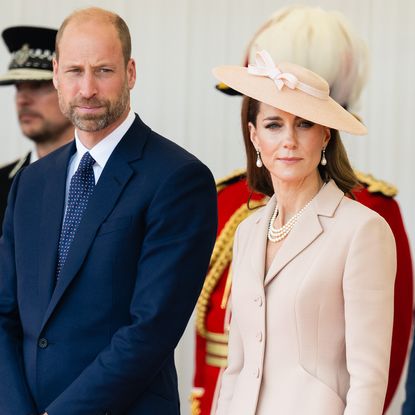 WINDSOR, ENGLAND - JULY 08: Prince William, Prince of Wales and Catherine, Princess of Wales on the Royal Dais at Datchet Road on July 08, 2025 in Windsor, England. President Emmanuel Macron and Mrs Brigitte Macron visit the UK in the first visit State Visit made by France in 17 years. They are staying at Windsor Castle, hosted by King Charles III and Queen Camilla, and a banquet will be held there in their honour. The Macrons will visit Imperial College, and the President will address Parliament during his stay. (Photo by Samir Hussein/WireImage)