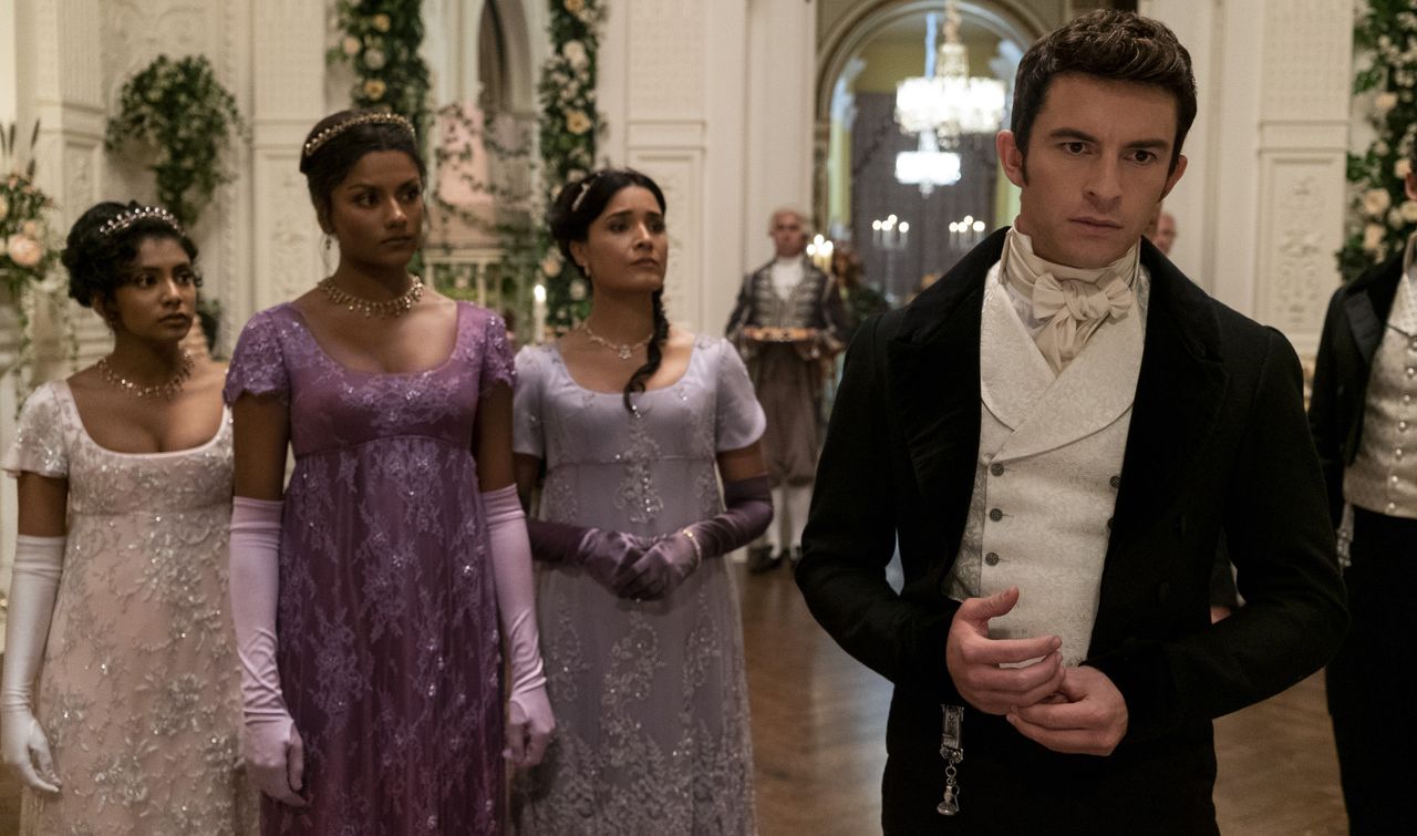 Charithra Chandran as Edwina Sharma, Simone Ashley as Kate Sharma, Shelley Conn as Mary Sharma, Jonathan Bailey as Anthony Bridgerton in episode 207 of Bridgerton