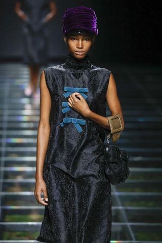 A model walks the runway at the Prada fashion show during the Milan Fashion Week Womenswear Fall/Winter 2024