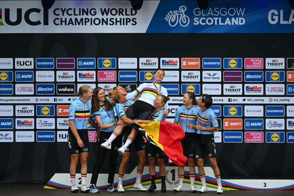 Winner Lotte Kopecky of Belgium celebrate with Belgian teammates Sanne Cant, Julie De Wilde, Justine Ghekiere, Marthe Goossens, Marthe Truyen and Julie Van De Velde