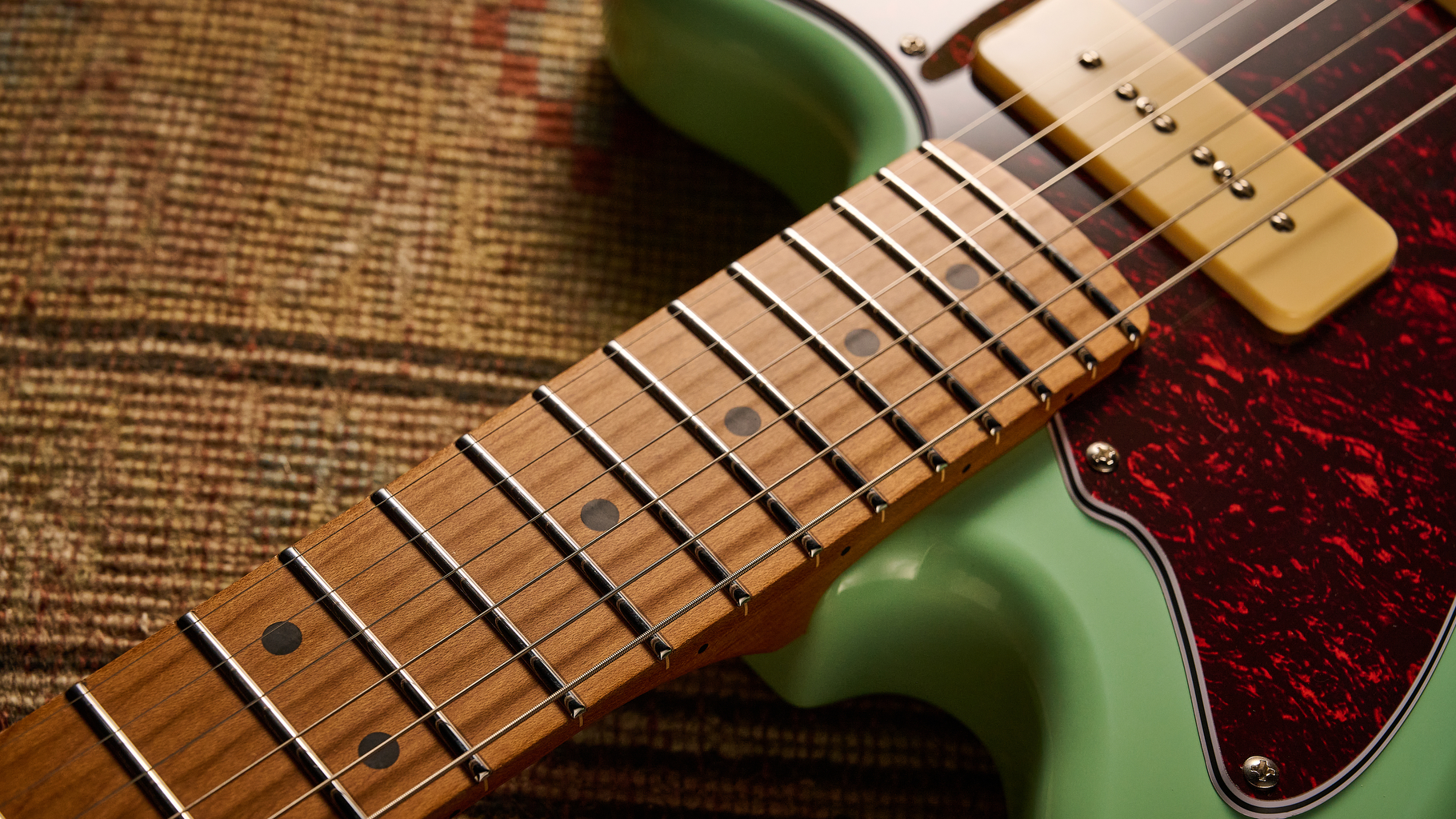 Close up of the neck of the Jet JJ-300 P90 electric guitar