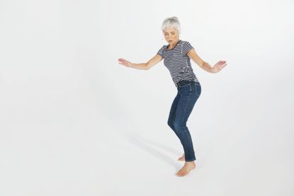 woman dancing in a white background