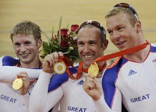 Jason Kenny, Jamie Staff and Chris Hoy celebrate team sprint gold at the 2008 Beijing Olympics