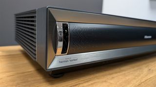 Hisense PX3-Pro ultra short throw projector slight angle showing front edge of projector