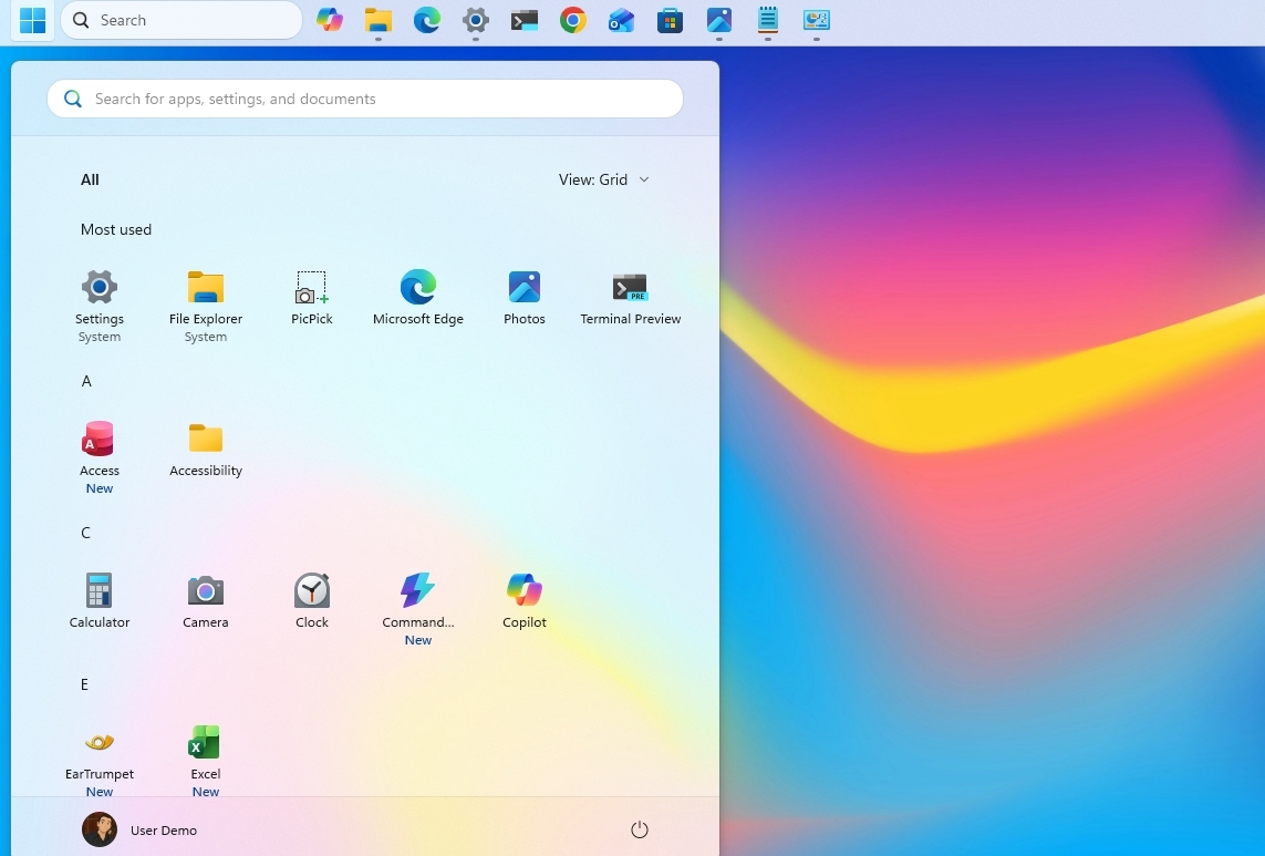 Windows 11 desktop with the taskbar aligned to the top of the screen.