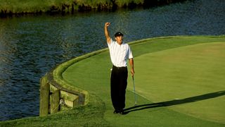 Tiger Woods celebrates his 60-foot putt at the 2001 Players Championship