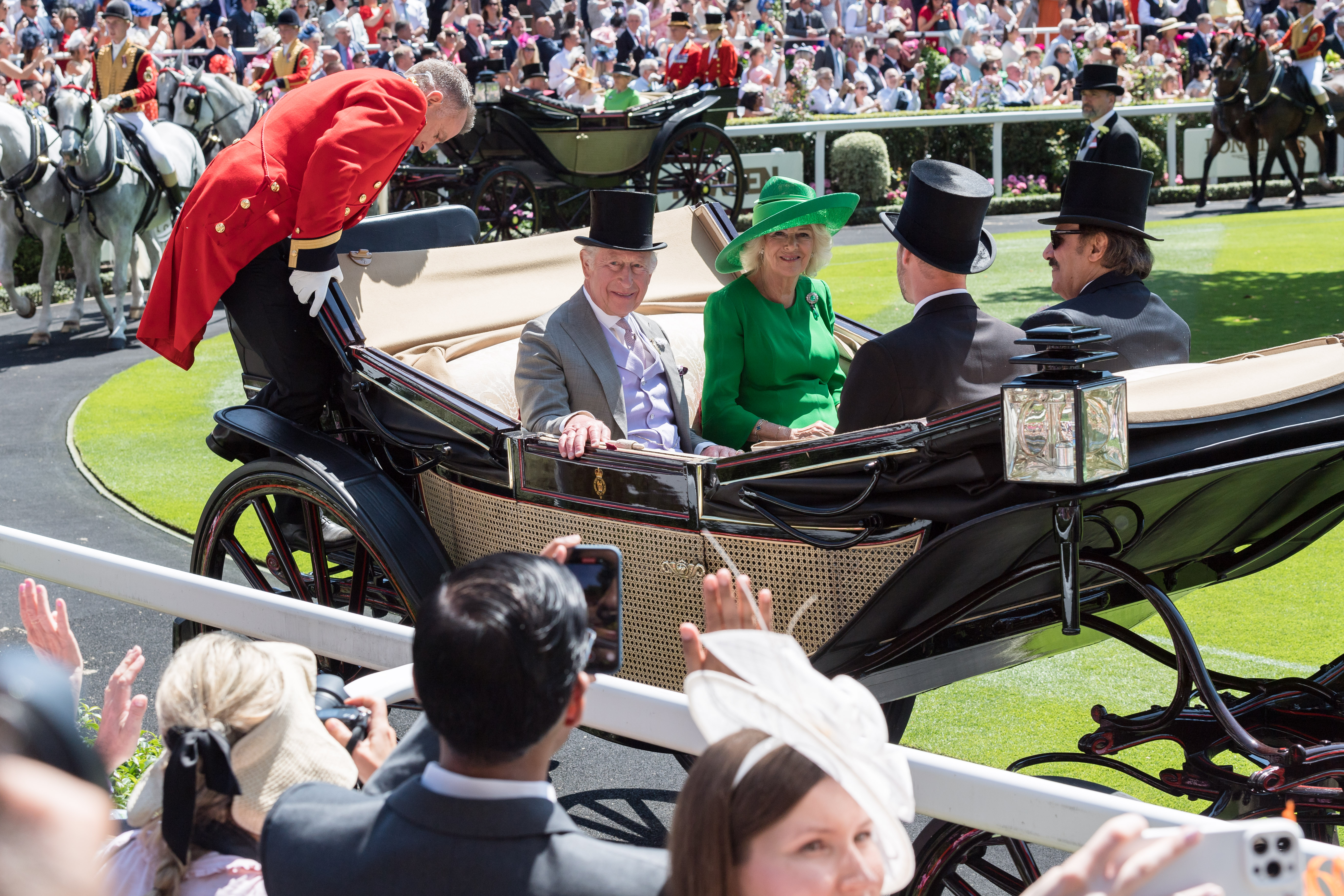King Charles, Prince William and Queen Camilla in a carriage at Royal Ascot