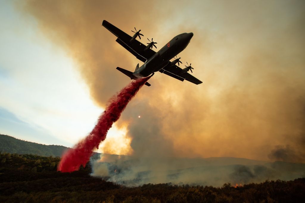 An air tanker drops fire retardant in Northern California.