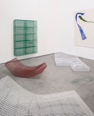 wire furniture and grey rug