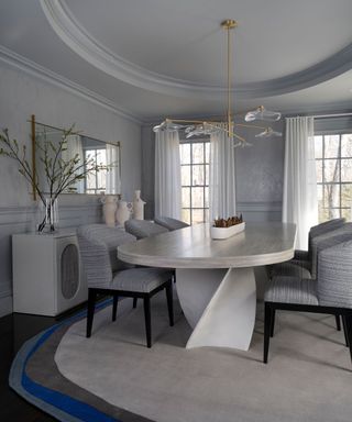 Large dining table in grey schemed dining room