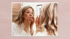 Image of a woman inspecting her skin in a bathroom mirror, set in a white frame and against a dusky pink watercolour-style background