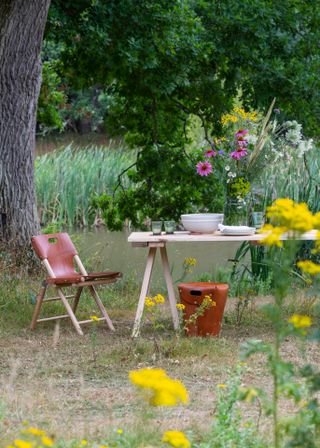 Bill Amberg chair and leather stool for Knepp estate photographed in the wild
