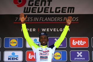 WEVELGEM BELGIUM MARCH 27 Biniam Hailu Girmay of Eritrea and Team Intermarch Wanty Gobert Matriaux celebrates winning the race on the podium ceremony after the 84th GentWevelgem in Flanders Fields 2022 Mens Elite a 2488km one day race from Ypres to Wevelgem GWE22 WorldTour on March 27 2022 in Wevelgem Belgium Photo by Tim de WaeleGetty Images