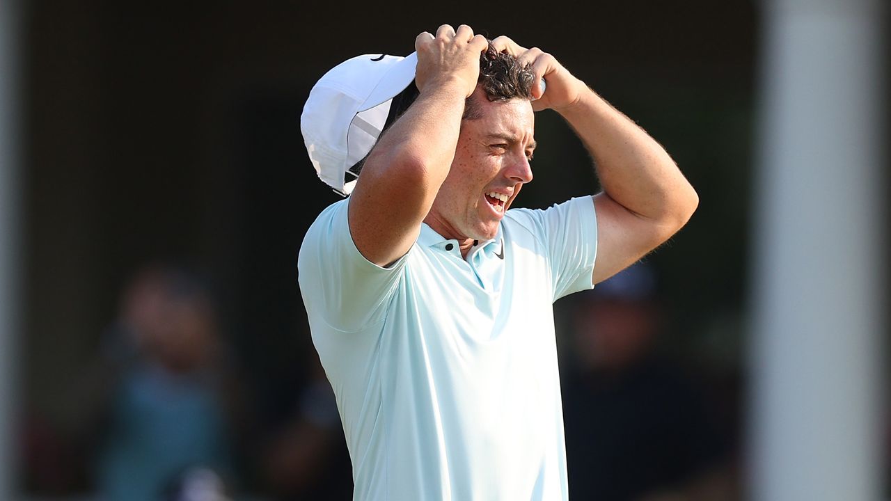 Rory McIlroy takes his cap off on the 18th hole at the 2024 US Open