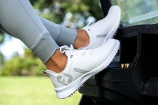 The women's FootJoy Fuel golf shoe in white and pink