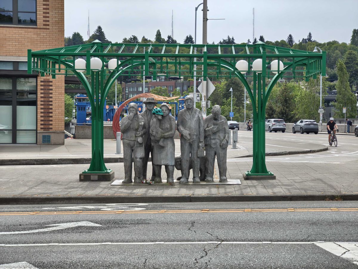 Statues on a sidewalk