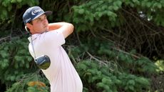 J.T. Poston plays his shot from the second tee during the 3M Open.