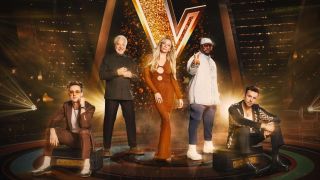 The new The Voice UK judging line-up of (L-R) Tom Fletcher, Tom Jones, LeAnn Rimes, will.i.am and Danny Jones pose on the show's set in-front of a large 'V' logo