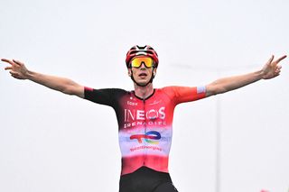 INEOS Grenadiers team's Dutch rider Thymen Arensman cycles to the finish line to win the 14th stage of the 112th edition of the Tour de France cycling race, 182.6 km between Pau and Luchon-Superbagneres, in the Pyrenees mountains of southwestern France, on July 19, 2025. (Photo by Marco BERTORELLO / AFP)