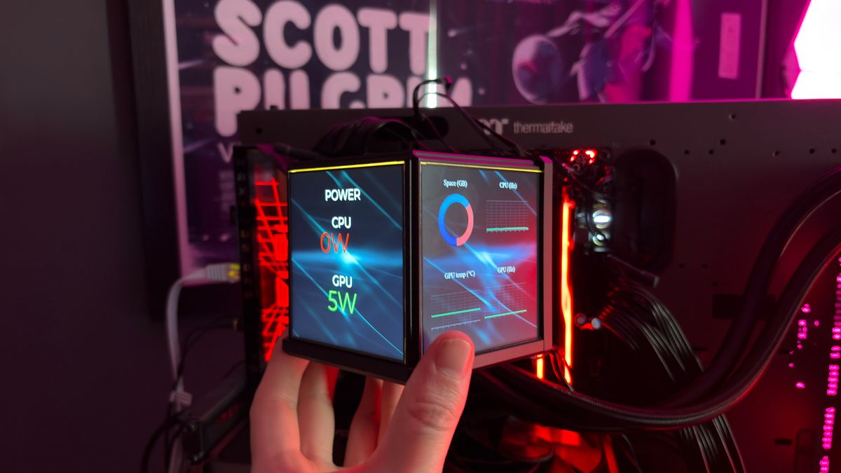 The Thermaltake Minecube 360 Ultra ARGB Sync set up on an open test bench.