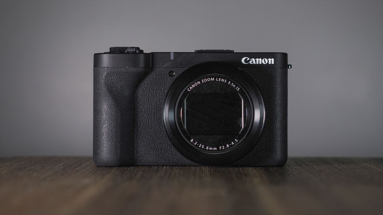 Canon PowerShot V1 on a wooden surface
