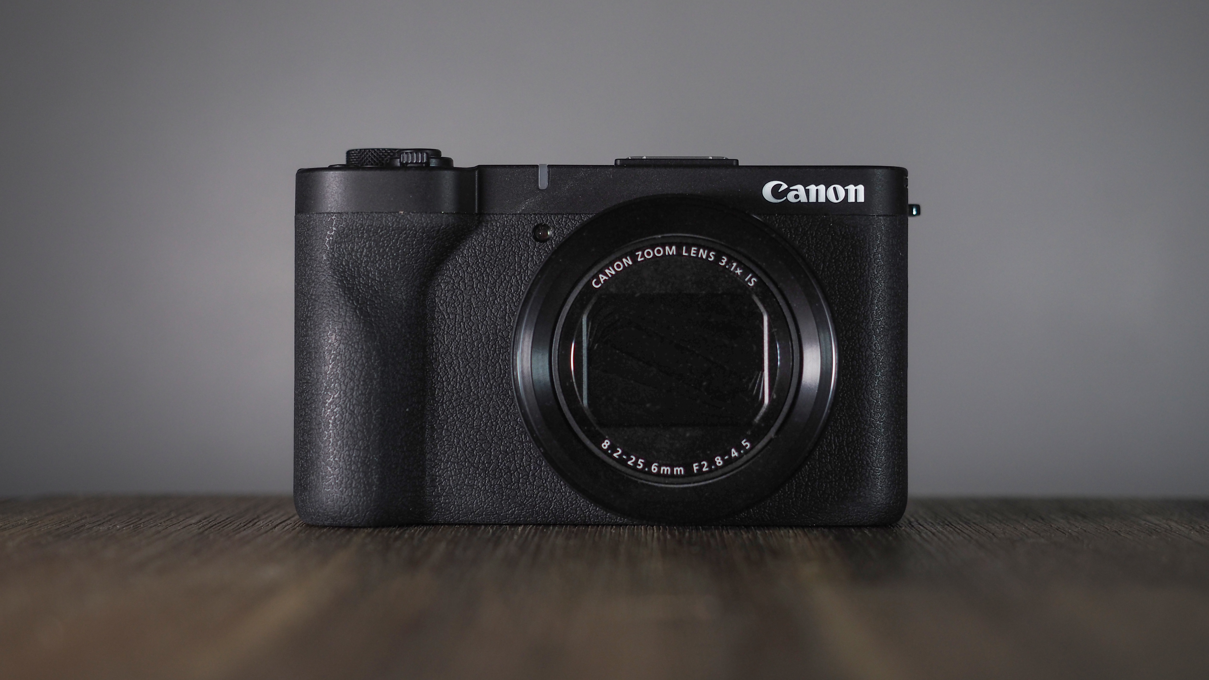 Canon PowerShot V1 on a wooden surface