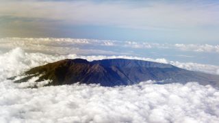 Mount Tambora from the sky, shrouded in clouds