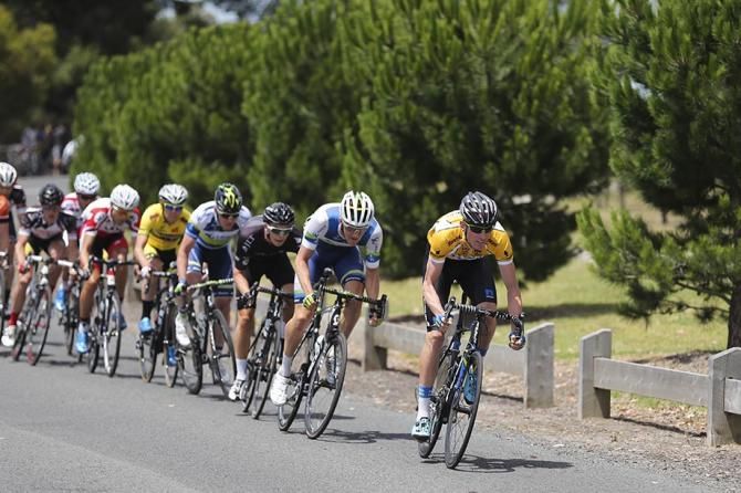 Zak Dempster leads the main group in pursuit of a break attempt