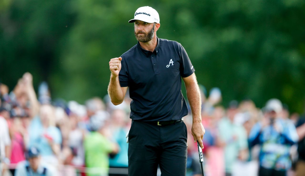 Dustin Johnson fist pumps after picking up the LIV Golf Tulsa title