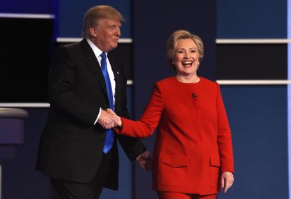 Hillary Clinton and Donald Trump shake hands after the first presidential debate