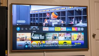 Amazon Fire TV Stick HD plugged into TV