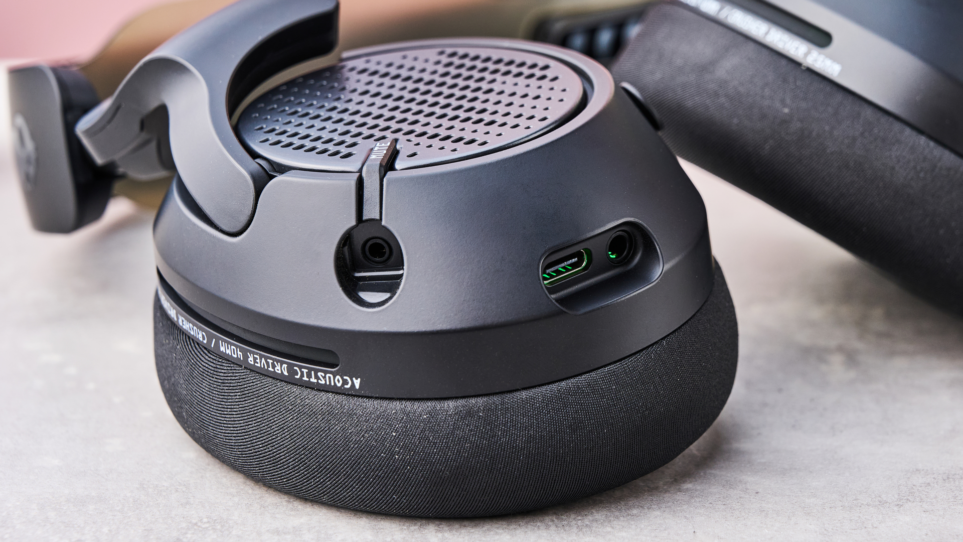 Close-up of ports on left-hand driver of Skullcandy Crusher PLYR 720