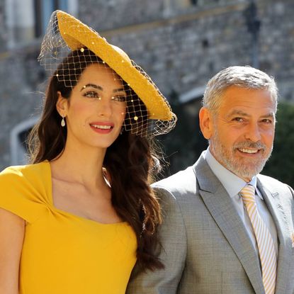 George and Amal Clooney attend Prince Harry's wedding