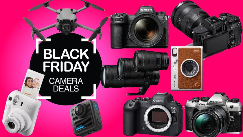 A drone, instant cameras, mirrorless cameras and lenses on a pink background with Black Friday camera deals overlay 