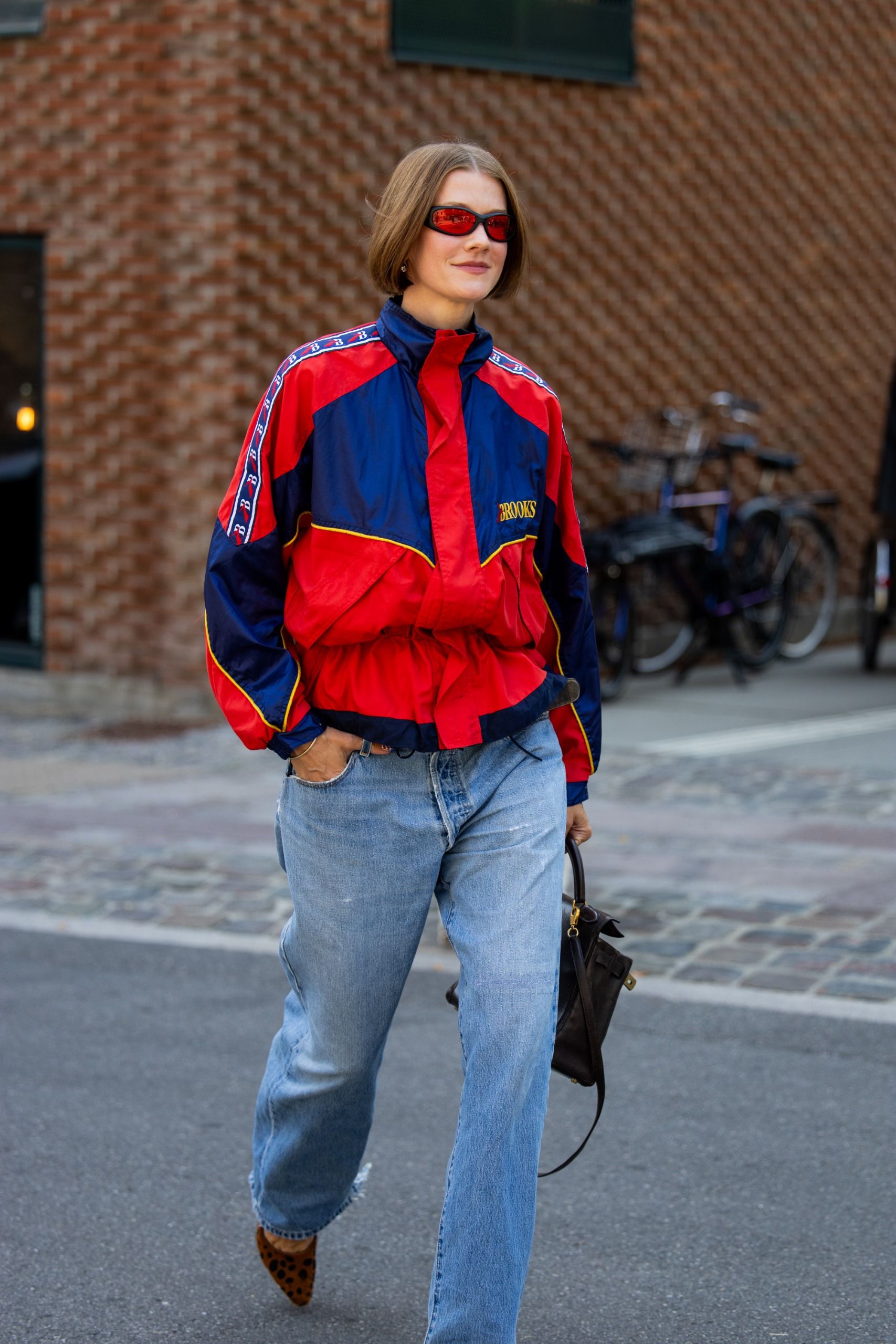 women in windbreaker jacket